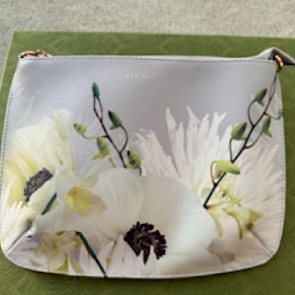 Ted Baker London flower clutch with rose color zipper. Pet & smoke free environm